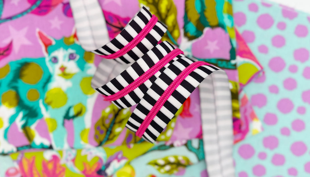 Striped, printed, and novelty zipper tape — zebras, florals, denim, and rainbow patterns