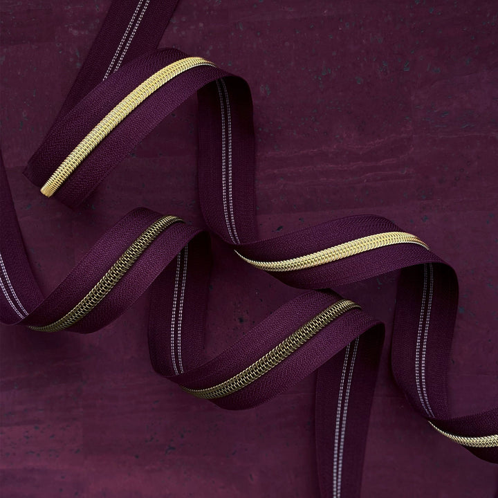 Plum - #5 Gold Nylon Coil Zipper Tape